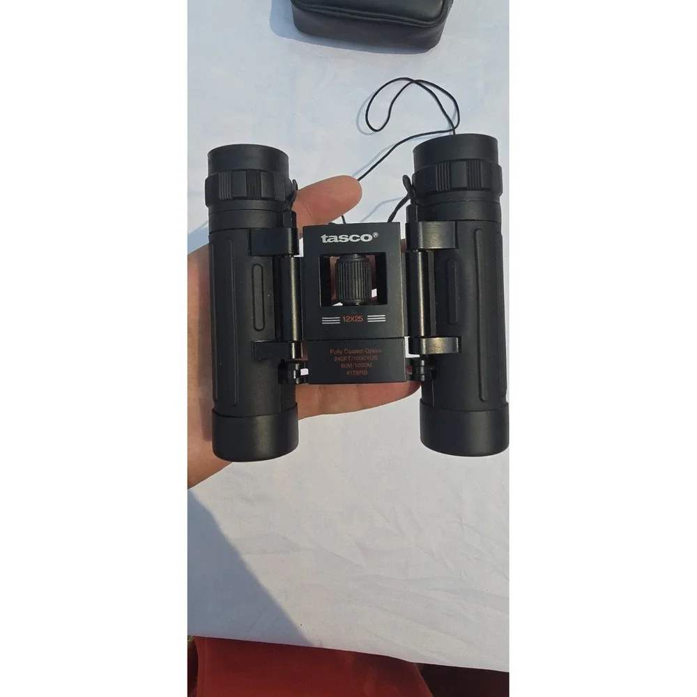 Tasco 10x25 compact binoculars With Case